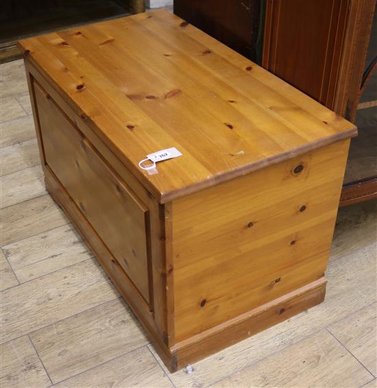 A modern panelled pine chest W.92cm
